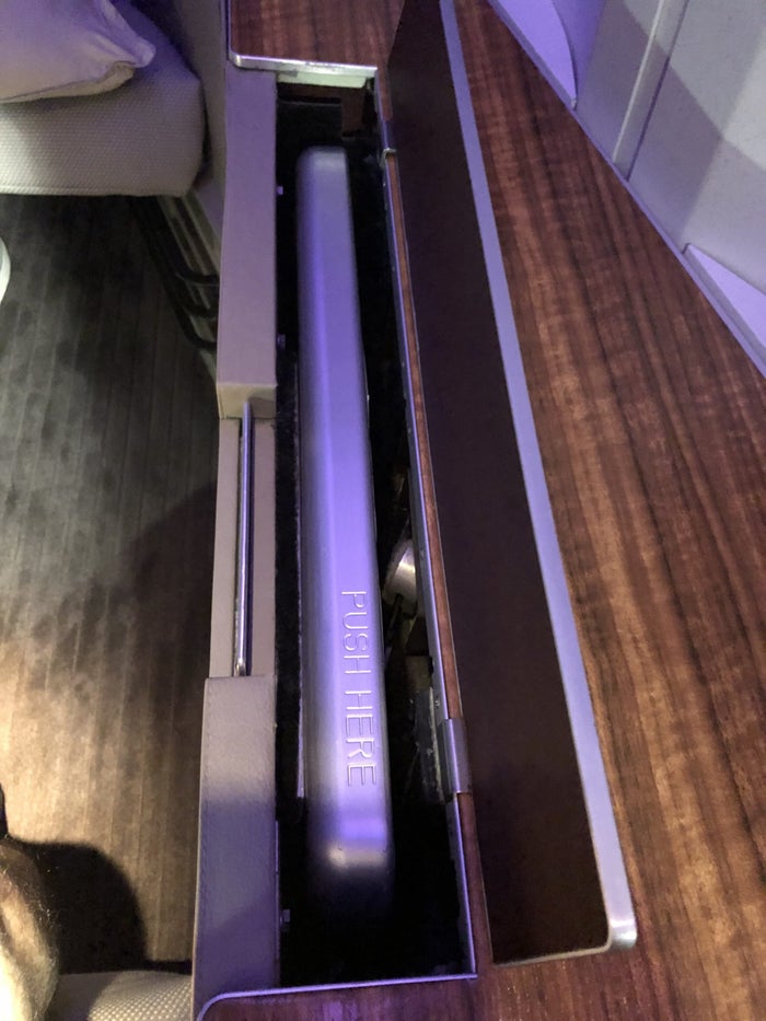 Cathay Pacific 777 first class tray table stowed