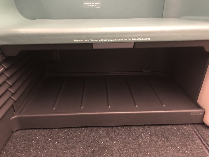 Korean Air first class under seat storage 1