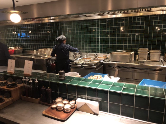 The Pier, Business at Hong Kong International Airport noodle bar open-air kitchen The Pier, Business at Hong Kong International Airport noodle bar open-air kitchen