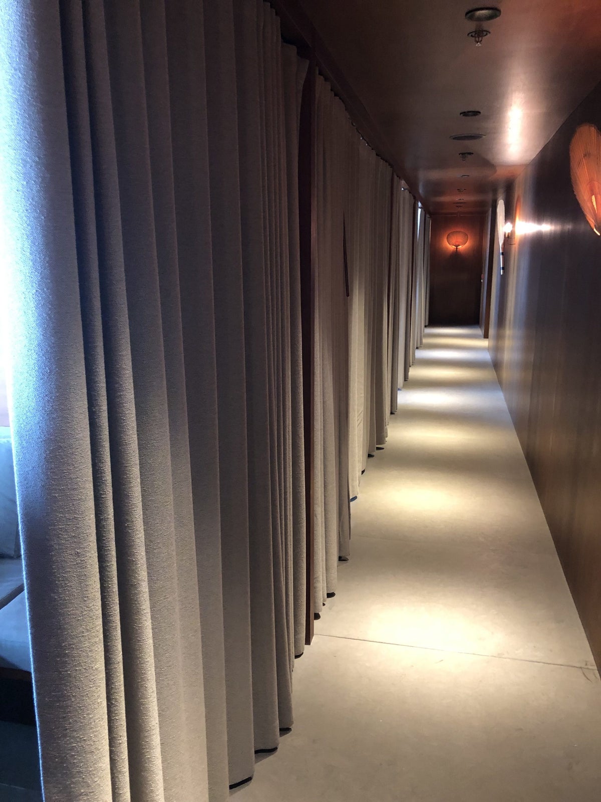The Pier, First Lounge at Hong Kong International Airport day suites hallway