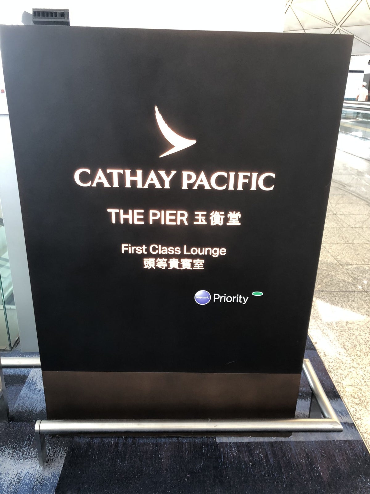 The Pier, First Lounge at Hong Kong International Airport sign