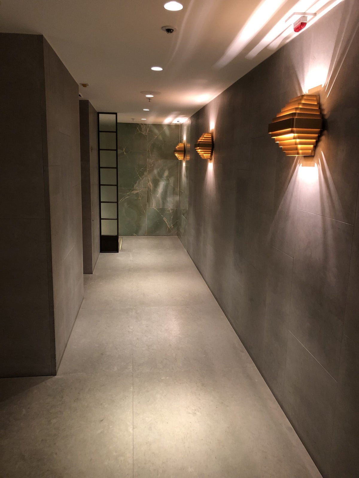 The Pier, First at Hong Kong International Airport hallway to shower suites