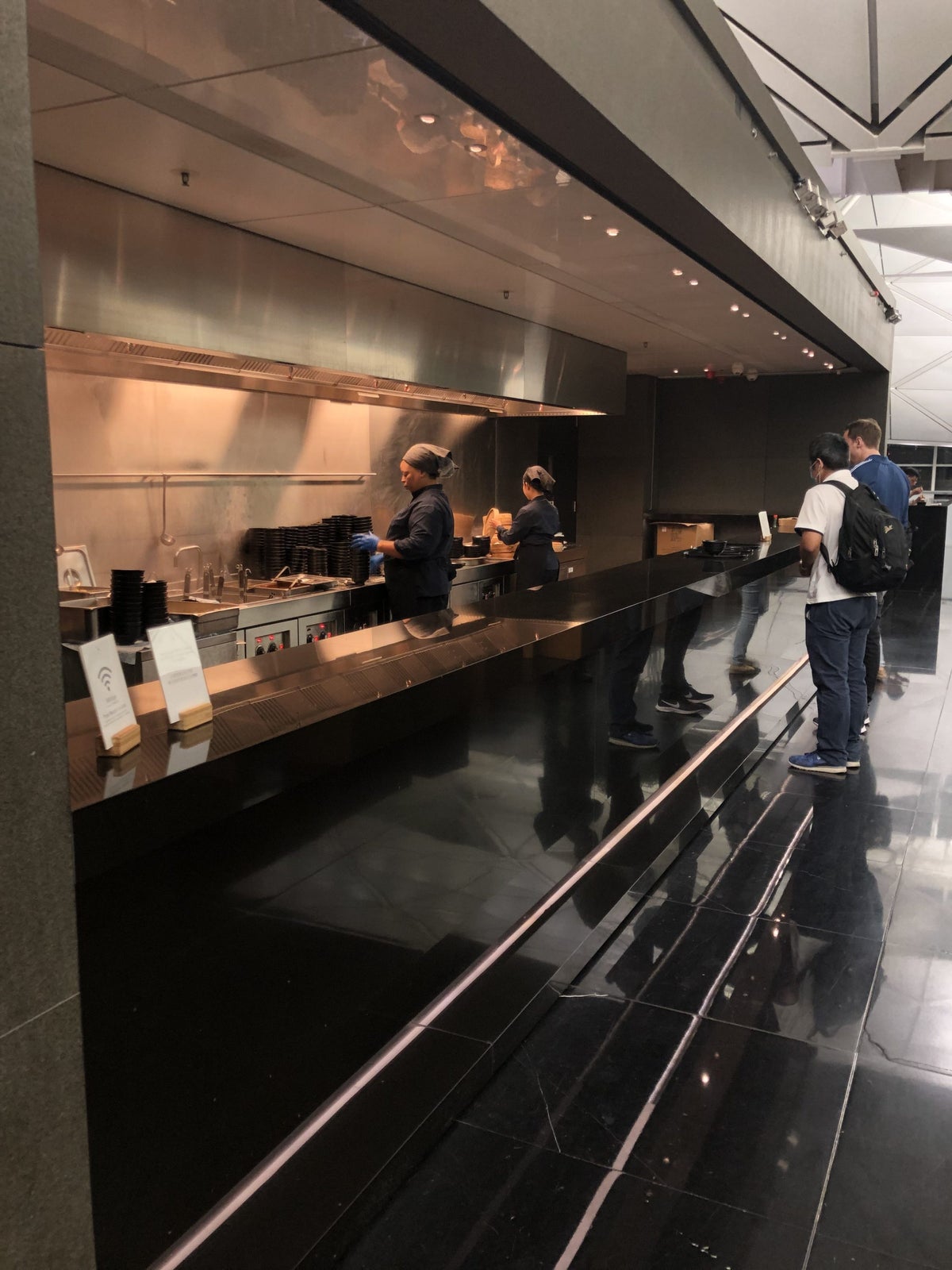 The Wing, Business at Hong Kong International Airport noodle bar kitchen