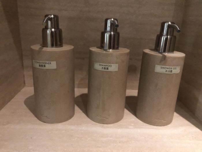 The Wing, First at Hong Kong International Airport cabana shower amenities