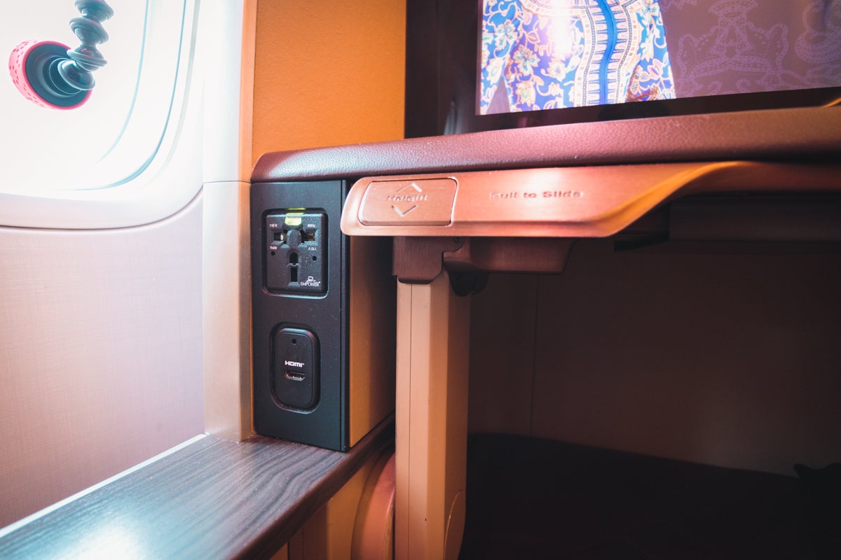Singapore Airlines Boeing 777 First Class - Power & Tray Table