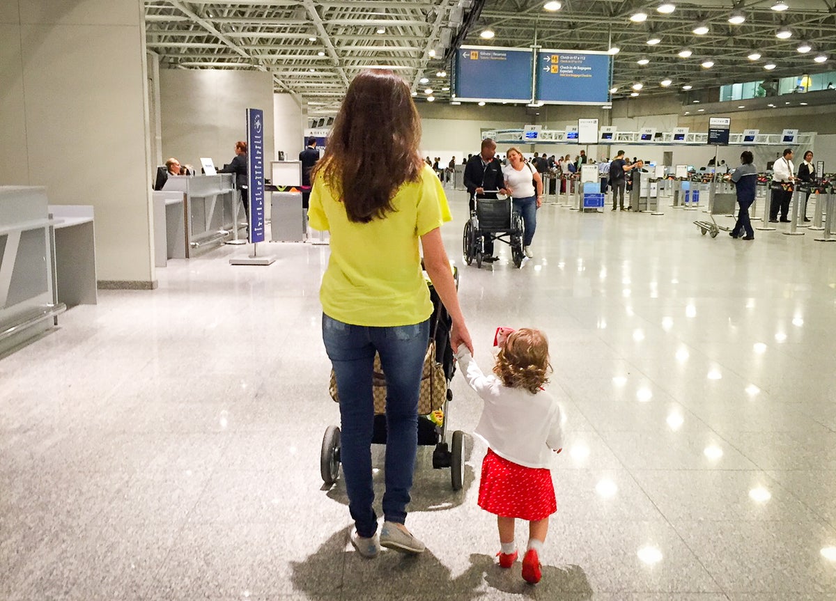 Mom and Daughter walking in GIG airport
