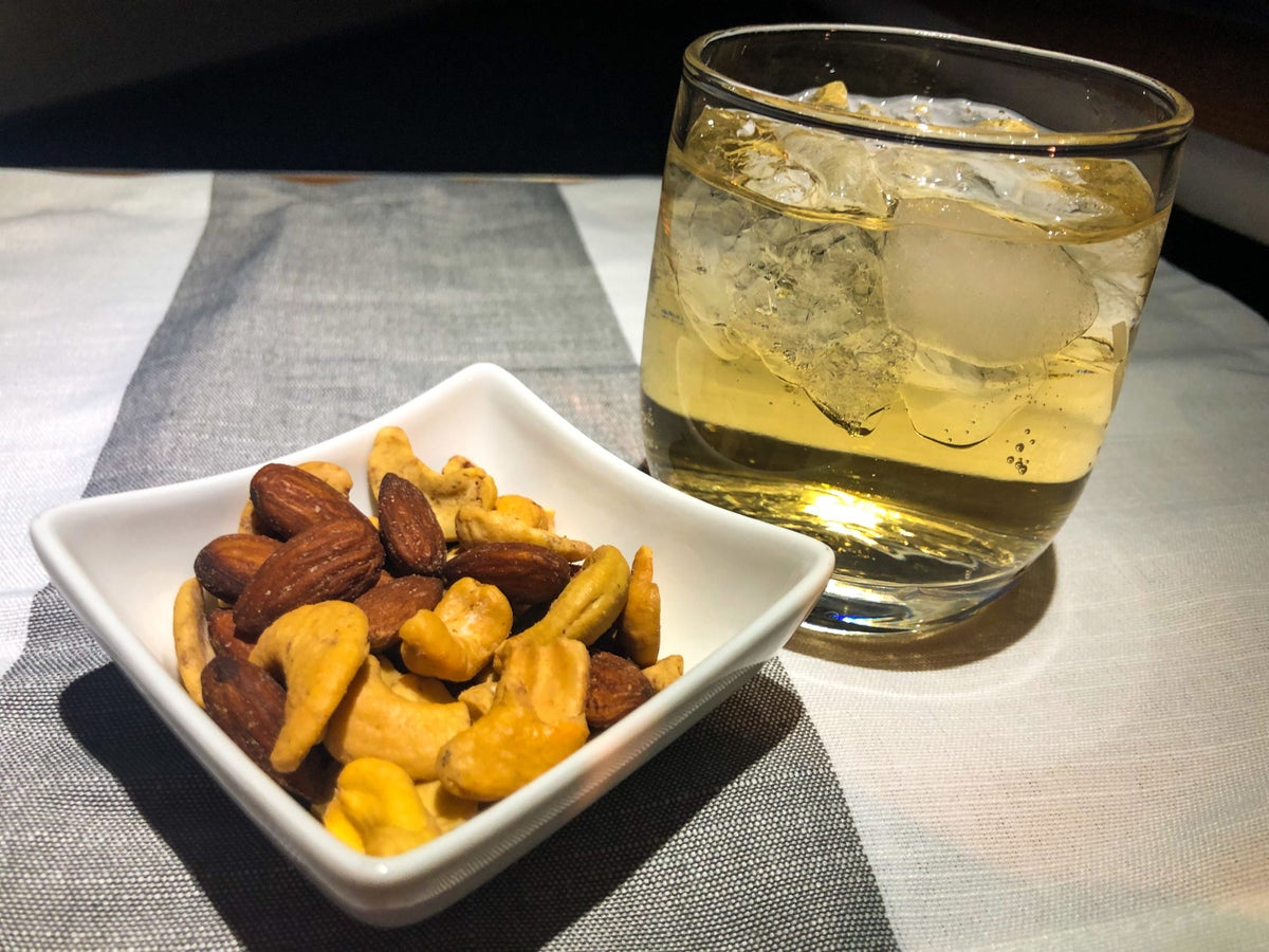 American Airlines Flagship First Class A321T soda and nuts