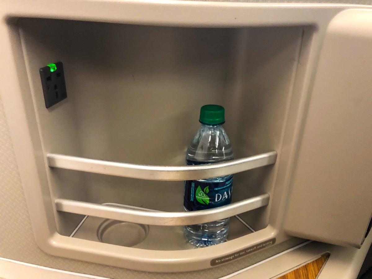 American Airlines Flagship First Class A321T water bottle and storage compartment