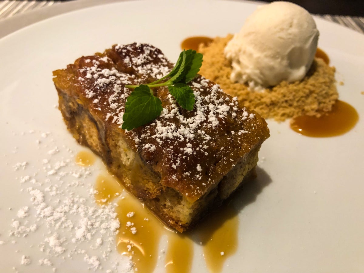 American Airlines Flagship First Dining LAX coconut pumpkin bread pudding close-up