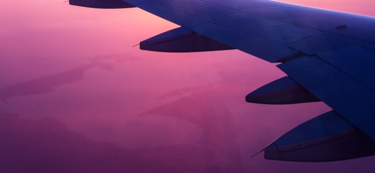 View Of A Pink Sky From An Airplane