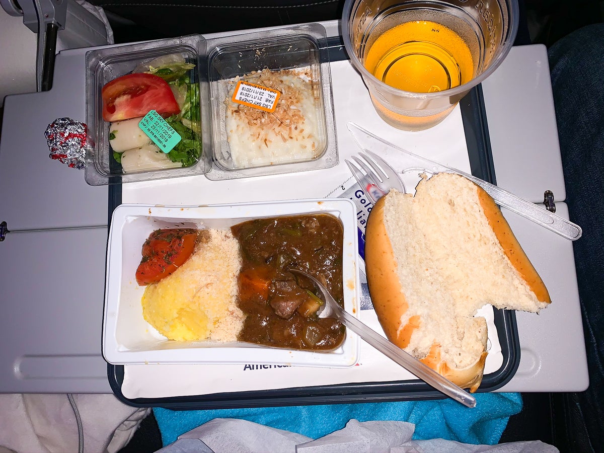 American Airlines 777-200 Economy meal beef stroganoff and apple juice