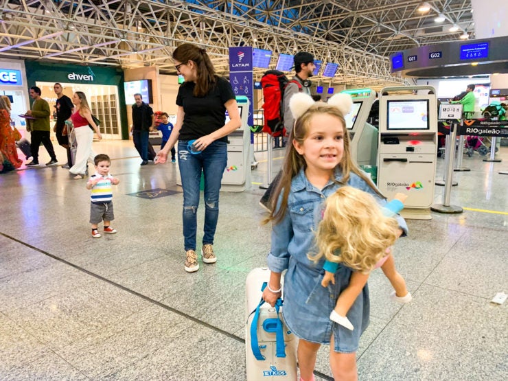 Family checking in at Rio de Janeiro International Airport.
