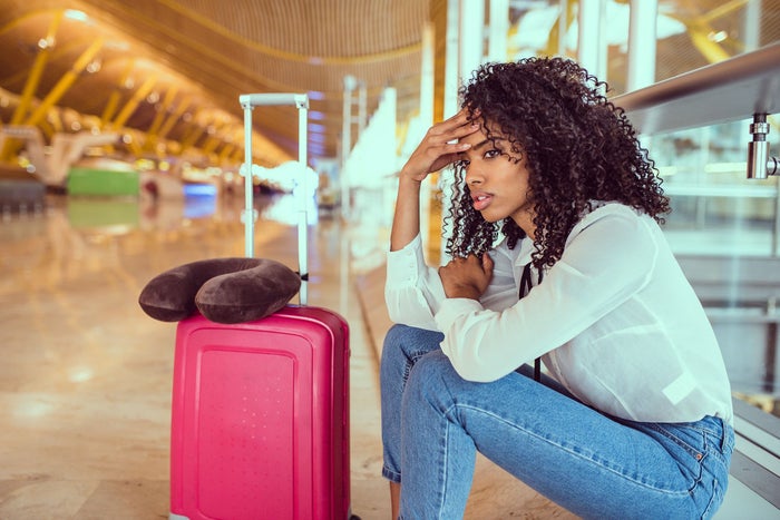 Woman Stressed with Luggage Woman Stressed with Luggage