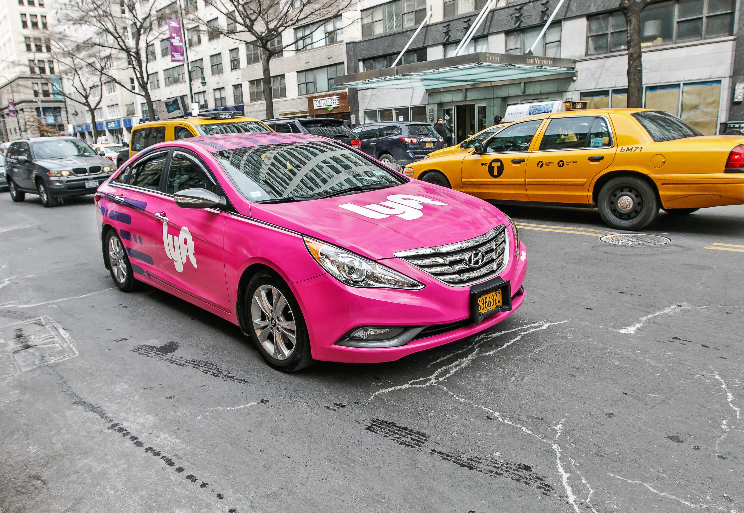 Pink Car With Lyft Branding in Manhattan