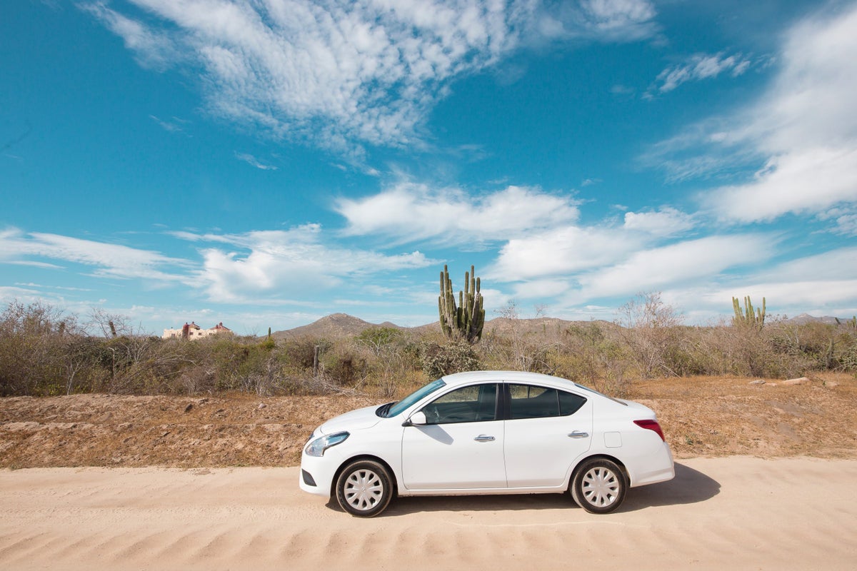 White car in the desert