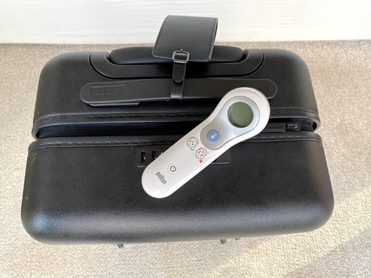 Braun Touchless Forehead Thermometer on Away Carry On Bag