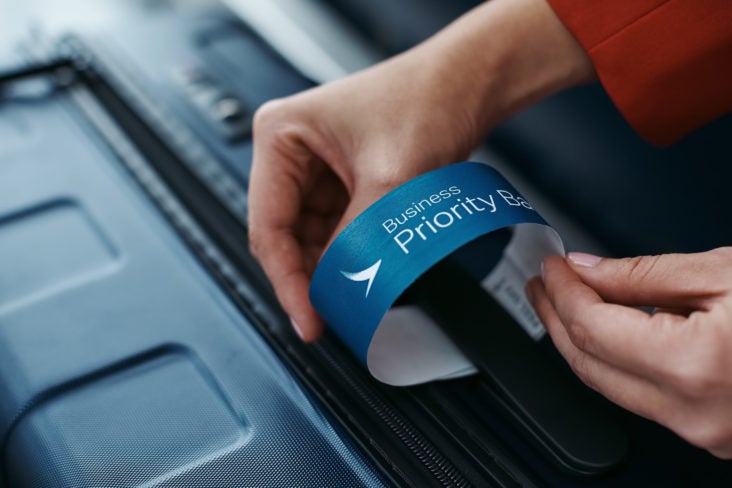 Cathay Pacific Plane on A Runway cathay check in bag