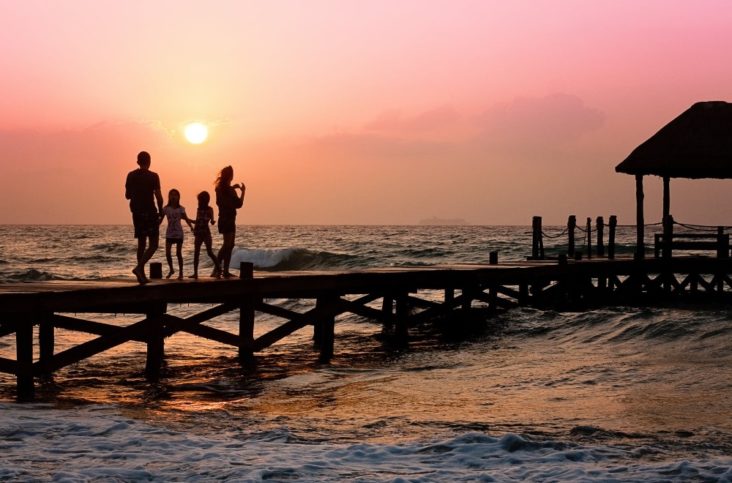 Family watching sunset Family watching sunset