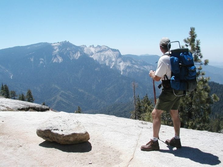 Hiker on the High Sierra Trail in the Sequoia and Kings Canyon National Park Hiker on the High Sierra Trail in the Sequoia and Kings Canyon National Park