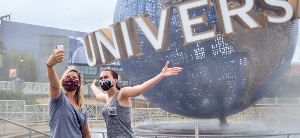 Universal Orlando Reopening Entrance with 2 girls Wearing Masks