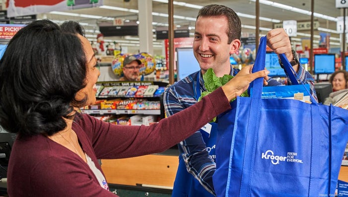 Kroger clerk and customer