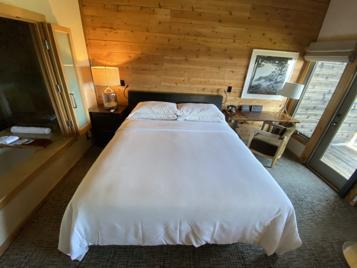 Ventana Big Sur an Alila Resort Ventana fireplace guestroom bed Ventana Big Sur an Alila Resort Ventana fireplace guestroom bed