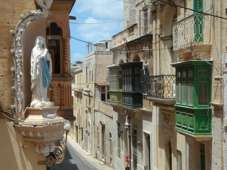 Malta statue and street view Malta statue and street view