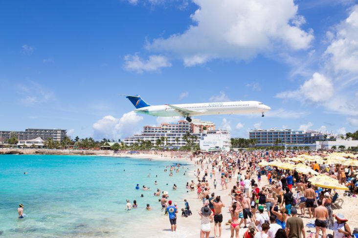 Saint Maarten airplane landing by beach Saint Maarten airplane landing by beach
