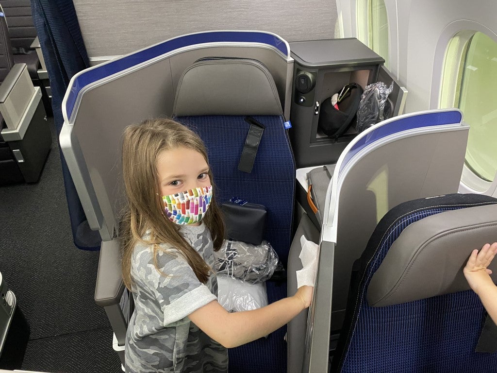 Sanitizing United Polaris Business Class Seats with wipes