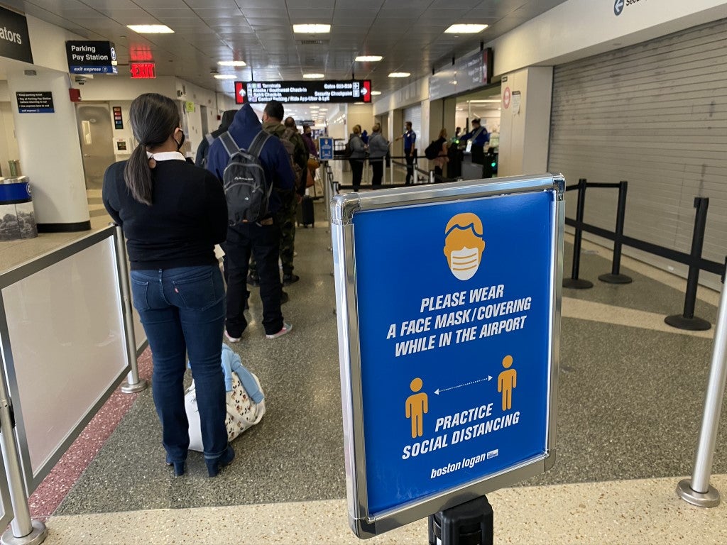 Social Distancing sign at TSA security at Boston Logan Airport BOS