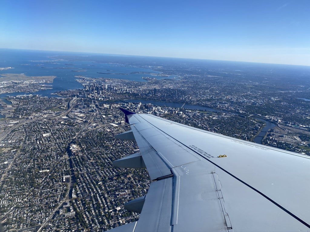United Airbus A319 wing over Boston