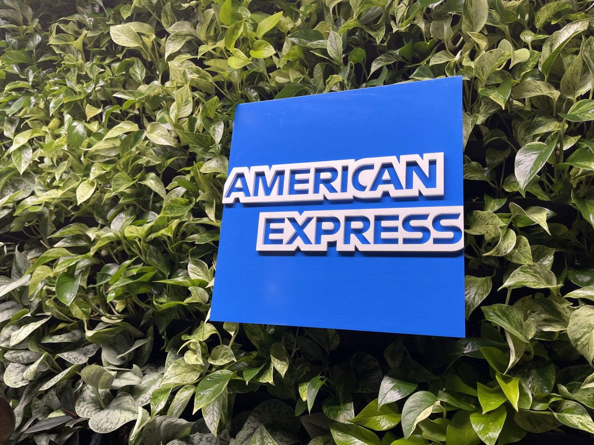 American Express logo on green wall of Centurion Lounge Phoenix