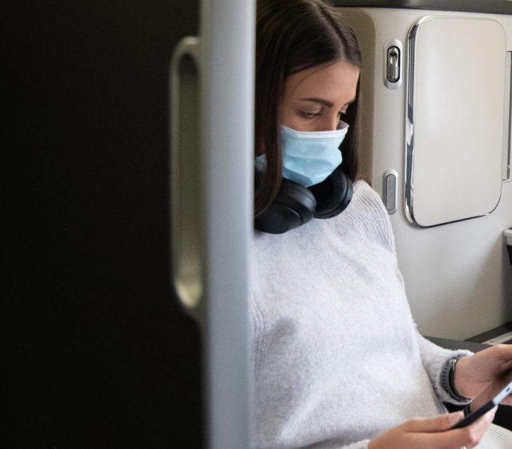 British Airways girl wearing a mask in business class British Airways girl wearing a mask in business class