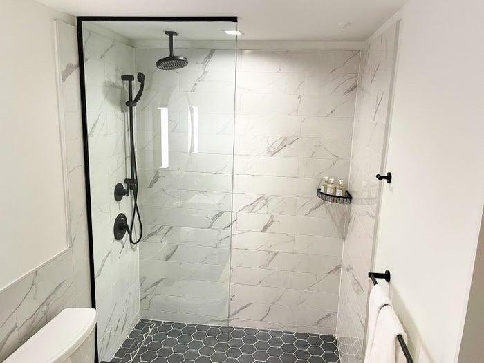 C. Baldwin Curio Collection Hilton Hotel in Houston Texas shower