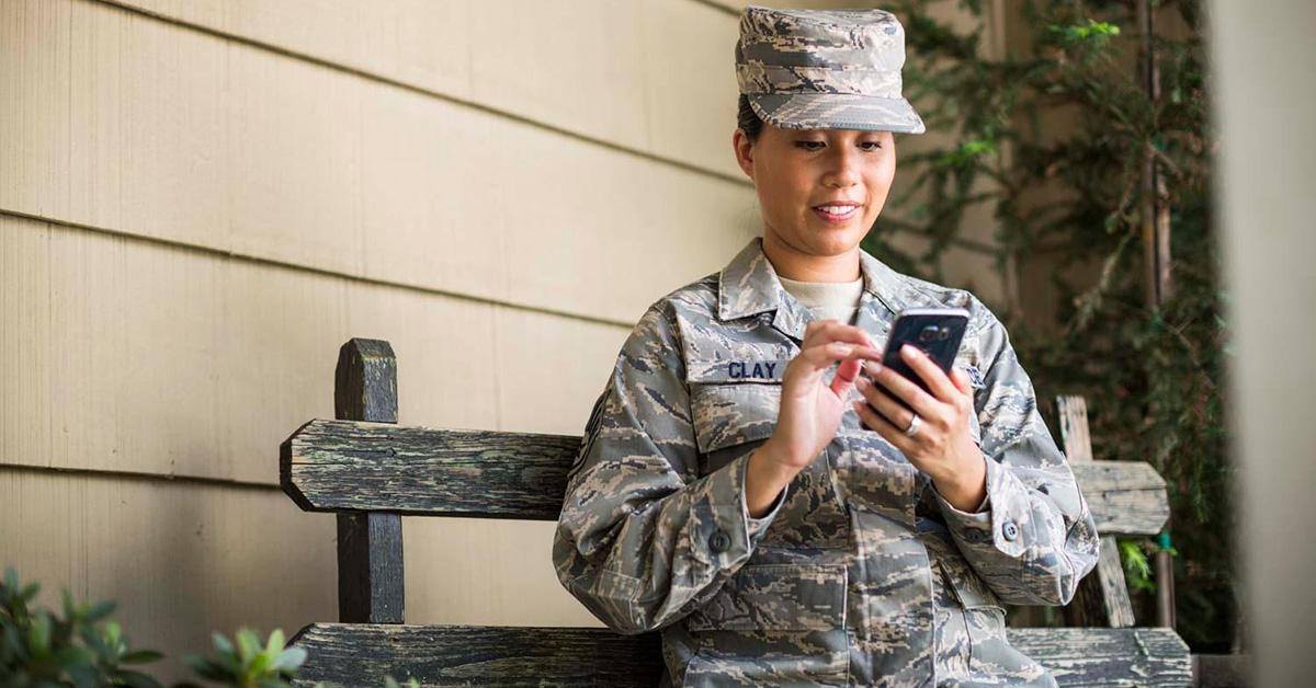 Military member uses cell phone