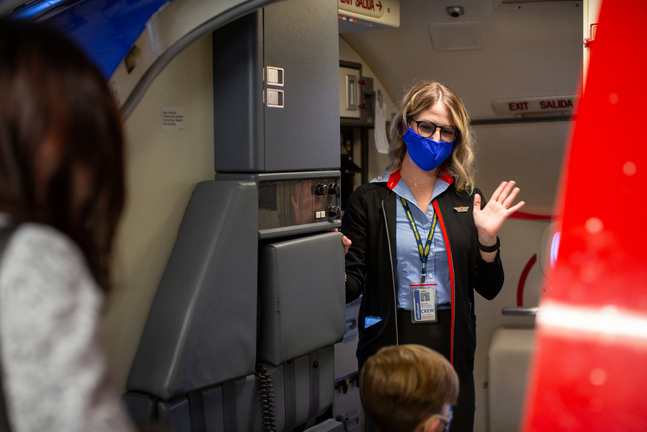 Southwest crew welcoming child Southwest crew welcoming child
