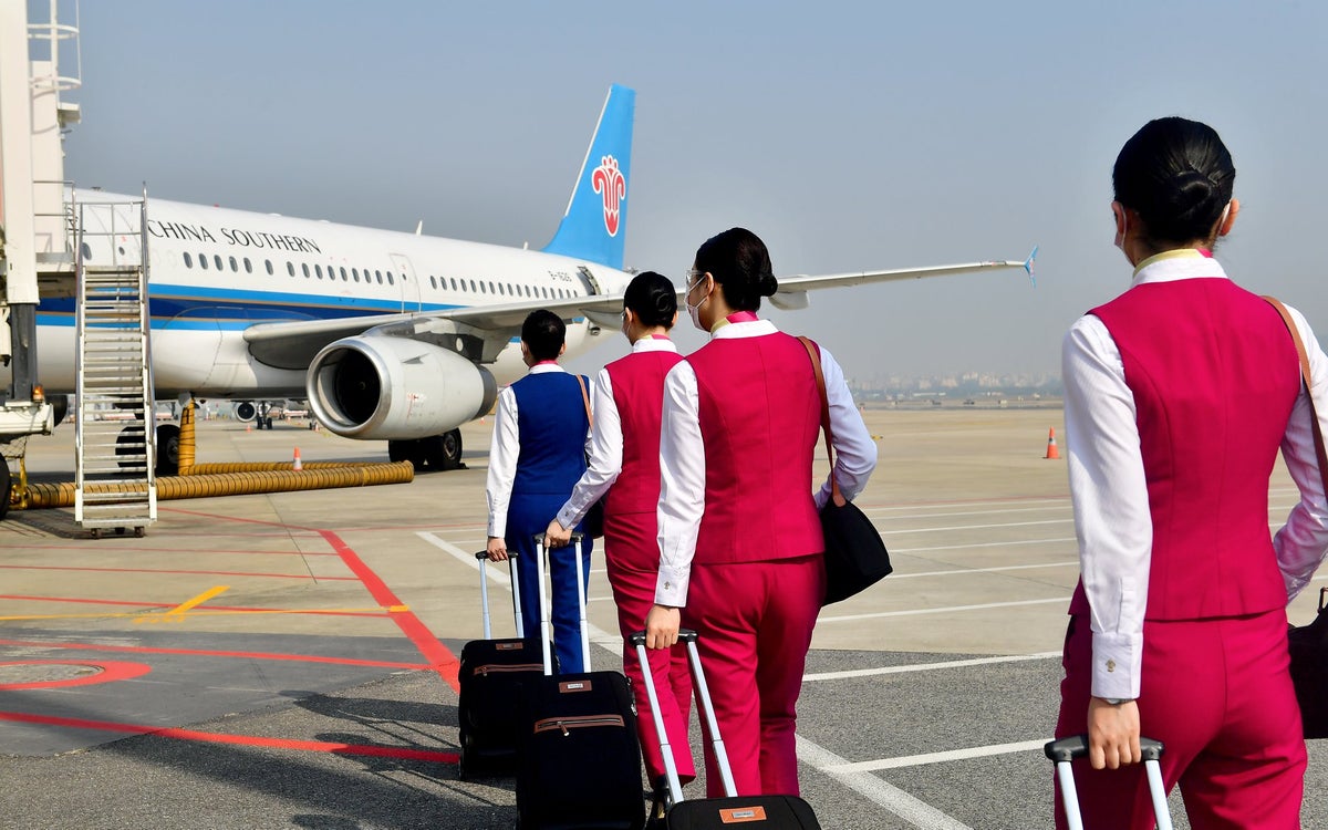China Southern flight attendants with baggage