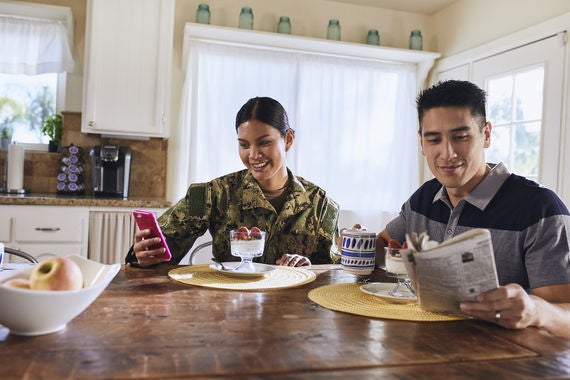Military woman with phone Military woman with phone