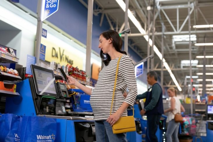 Walmart checkout Walmart Self Checkout side view pregnant woman
