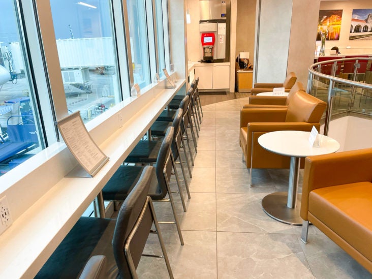 American Airlines Admirals Club at Orlando MCO seating with a view American Airlines Admirals Club at Orlando MCO seating with a view