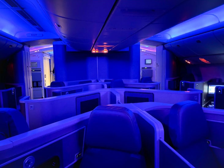 American Airlines 777 Flagship Business Class Seats at Night with Blue Lights American Airlines 777 Flagship Business Class Seats at Night with Blue Lights