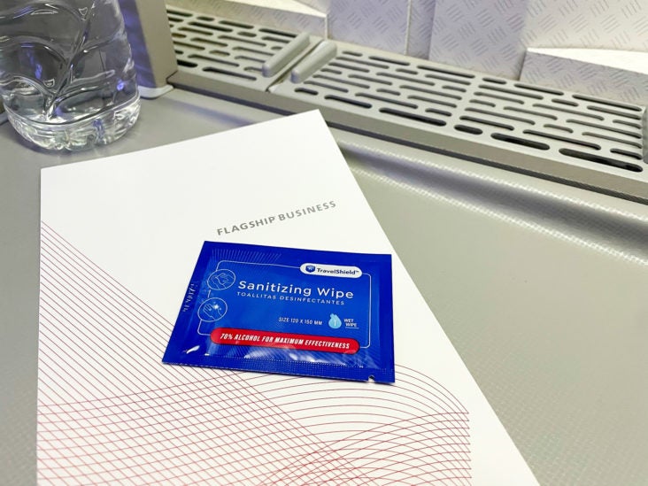 American Airlines 777 Flagship Business Class menu and wipe American Airlines 777 Flagship Business Class menu and wipe