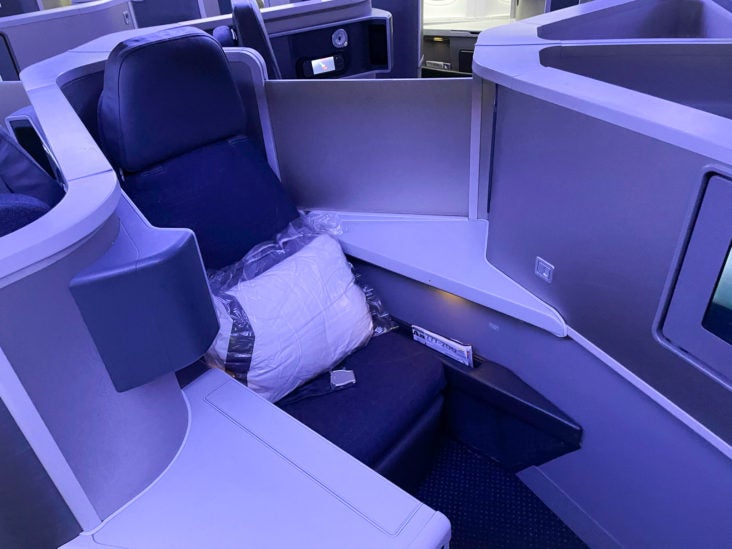 American Airlines 777 Flagship Business Class rear facing seat American Airlines 777 Flagship Business Class middle seat
