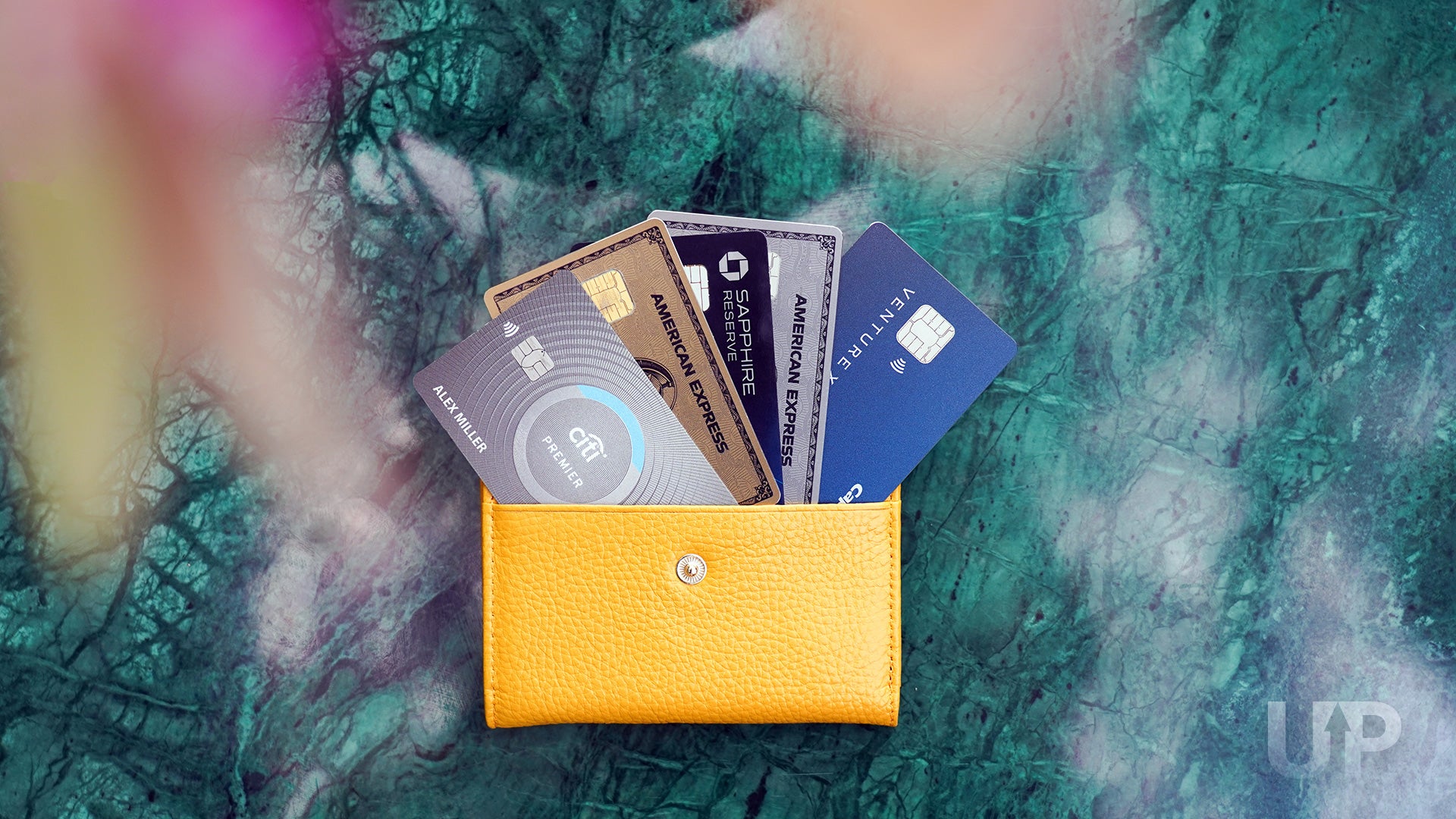 Premium Cards in a Yellow Wallet Upgraded Points LLC