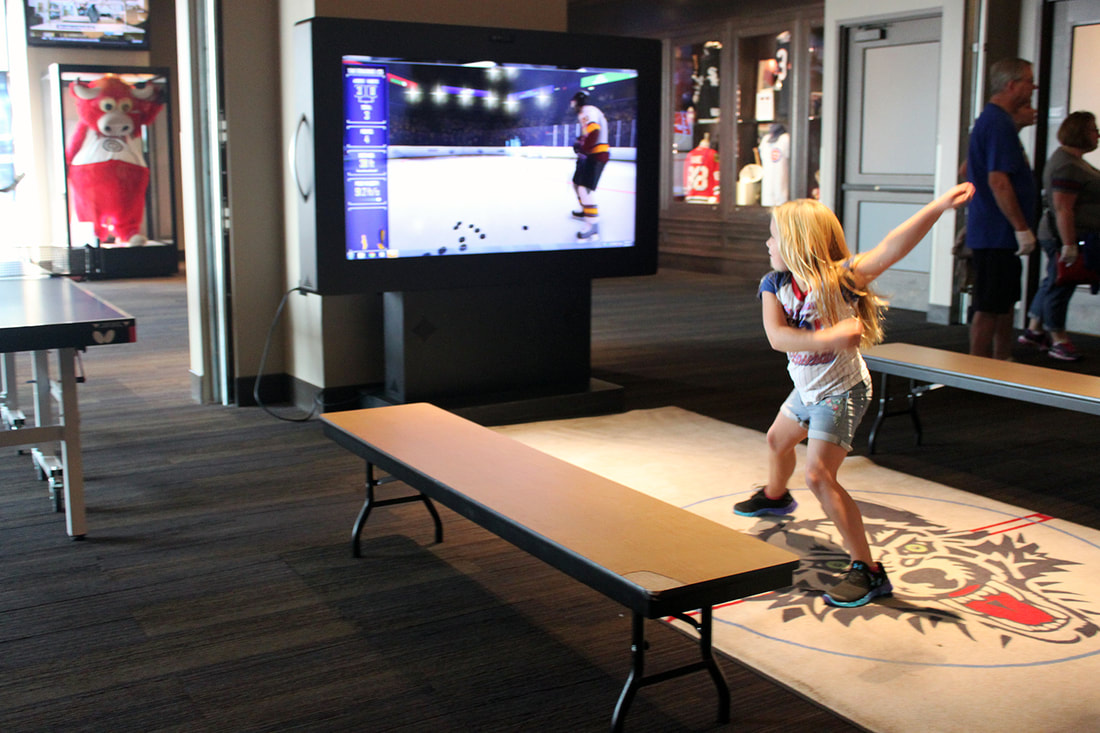 Chicago Sports Museum girl playing virtual hockey