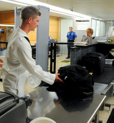 Navy sailor goes through TSA checkpoint Navy sailor goes through TSA checkpoint