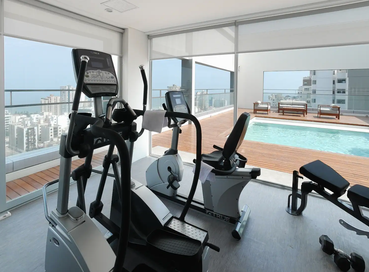 Rooftop gym and pool at Dazzler by Wyndham Lima Miraflores