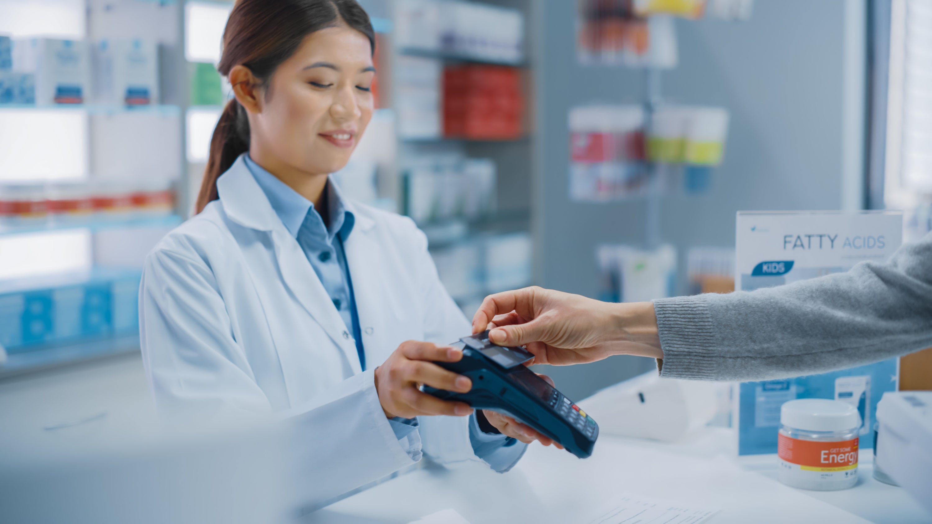 Pharmacy Customer Checking Out at Pharmacy