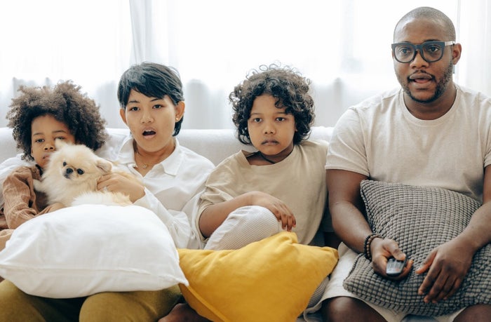 Family watching TV Family watching TV