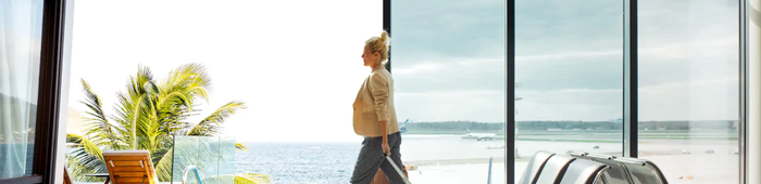 Woman Walking from Airport to Hotel